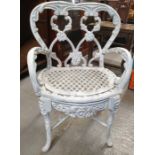 A 20th century iron painted garden chair, the back