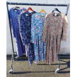 Four vintage floral Laura Ashley dresses, all full