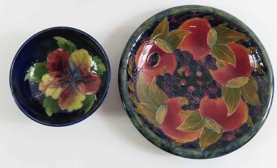 A Moorcroft Hibiscus bowl, 13.5cm, along with a pe