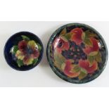 A Moorcroft Hibiscus bowl, 13.5cm, along with a pe