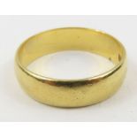 An 18ct gold wedding band, 5mm, finger size L cent