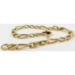 A lightly filed figaro link chain, unmarked, 22cm