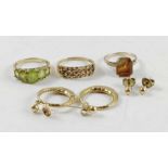 A 9ct gold peridot five stone dress ring,