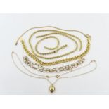 A 9ct gold flat snake bracelet, a 9ct gold double