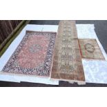 Three 20th century decorative silk rugs, various s