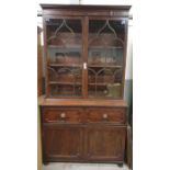 A Victorian mahogany two section bookcase, with a