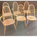 A set of four Ercol beech and elm chairs, along wi