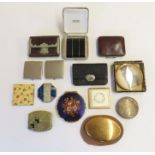 A collection of vintage compacts and purses