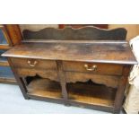 An early 19th century oak sideboard/dresser base,