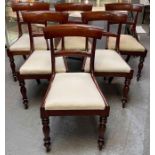 A set of six Victorian mahogany dining chairs