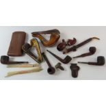A collection of pipes, pipe cases and related ephe