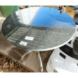 Polished granite top table with chrome base