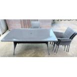 Large rattan & glass garden table along with 6 rat