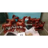 Collection of carved hardwood horses