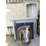 Mirrored console table, a painted fire surround, a