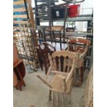 4 stick back dining chairs along with a side table