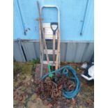 Lifting chain with hooks, tow rope, hand tools and