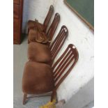 4 mid century style dining chairs along with a col