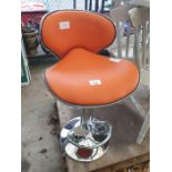 Retro style chrome and orange leatherette bar stoo