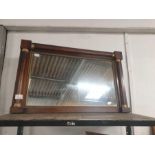 Regency style rosewood and gilt frame mirror