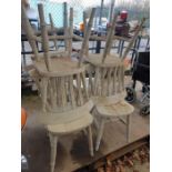 7 white painted wooden dining chairs