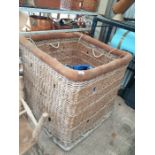 A wicker hot air balloon basket along with burner