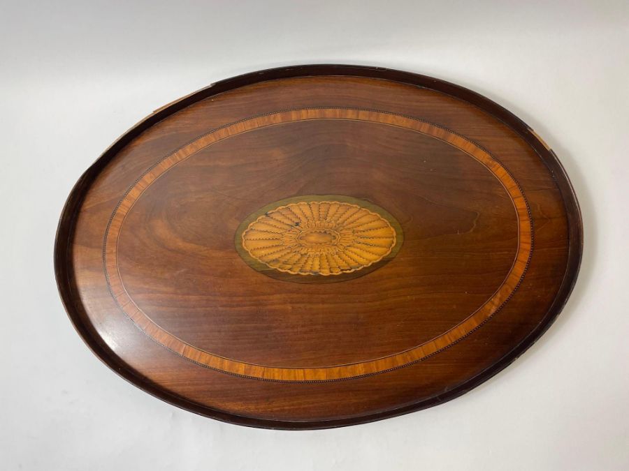 A 19th century inlaid oval mahogany tray, 70cm lon