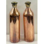 A pair of early 20th century coppered insulated bo