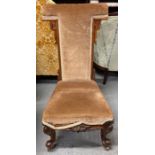 A Victorian Prie Dieu chair, standing on walnut le
