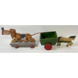 A circa 1930/40's pull along painted wooden toy ho