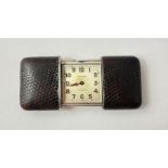 A Movado lizard/snakeskin purse or pocket watch, t