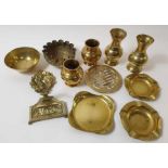 A quantity of decorative brass items including a F