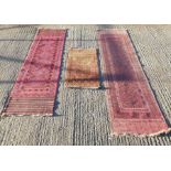 A collection of four 20th century rug including Tw