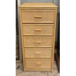 A 20th century cane type chest of drawers, with fi