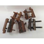 A collection of five vintage wood working planes