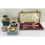 A silver cased child's fork, knife and spoon set;