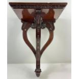 A 20th century mahogany wall bracket