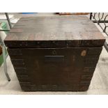 A 18th century oak and iron bound travelling trunk