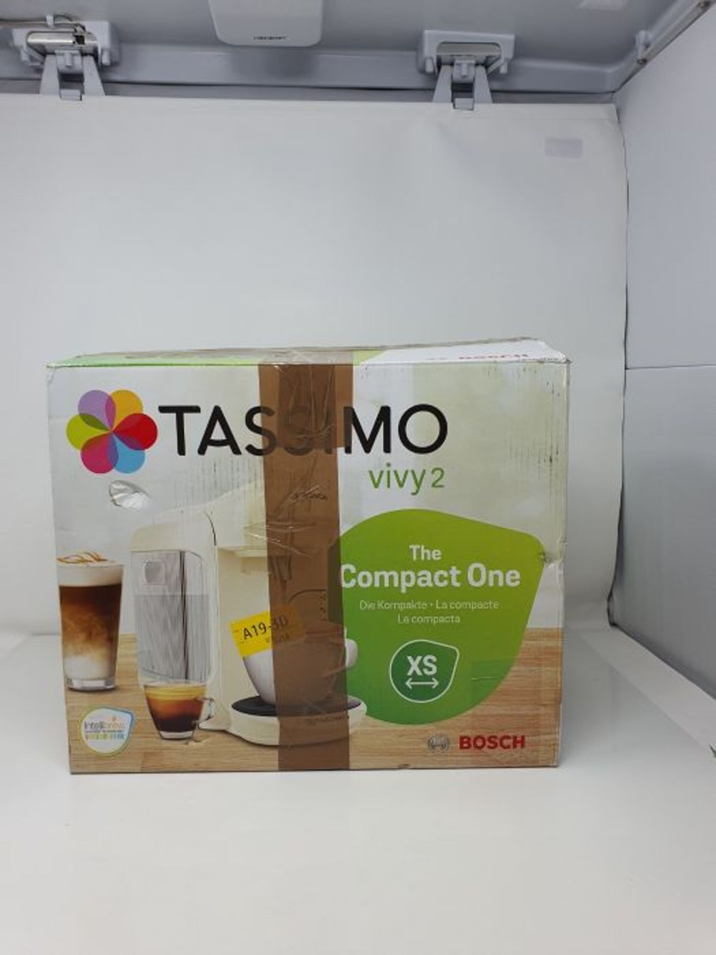 RRP £50.00 Bosch Tassimo TAS1407 Machine à café pour capsule, 0.7L, Crème