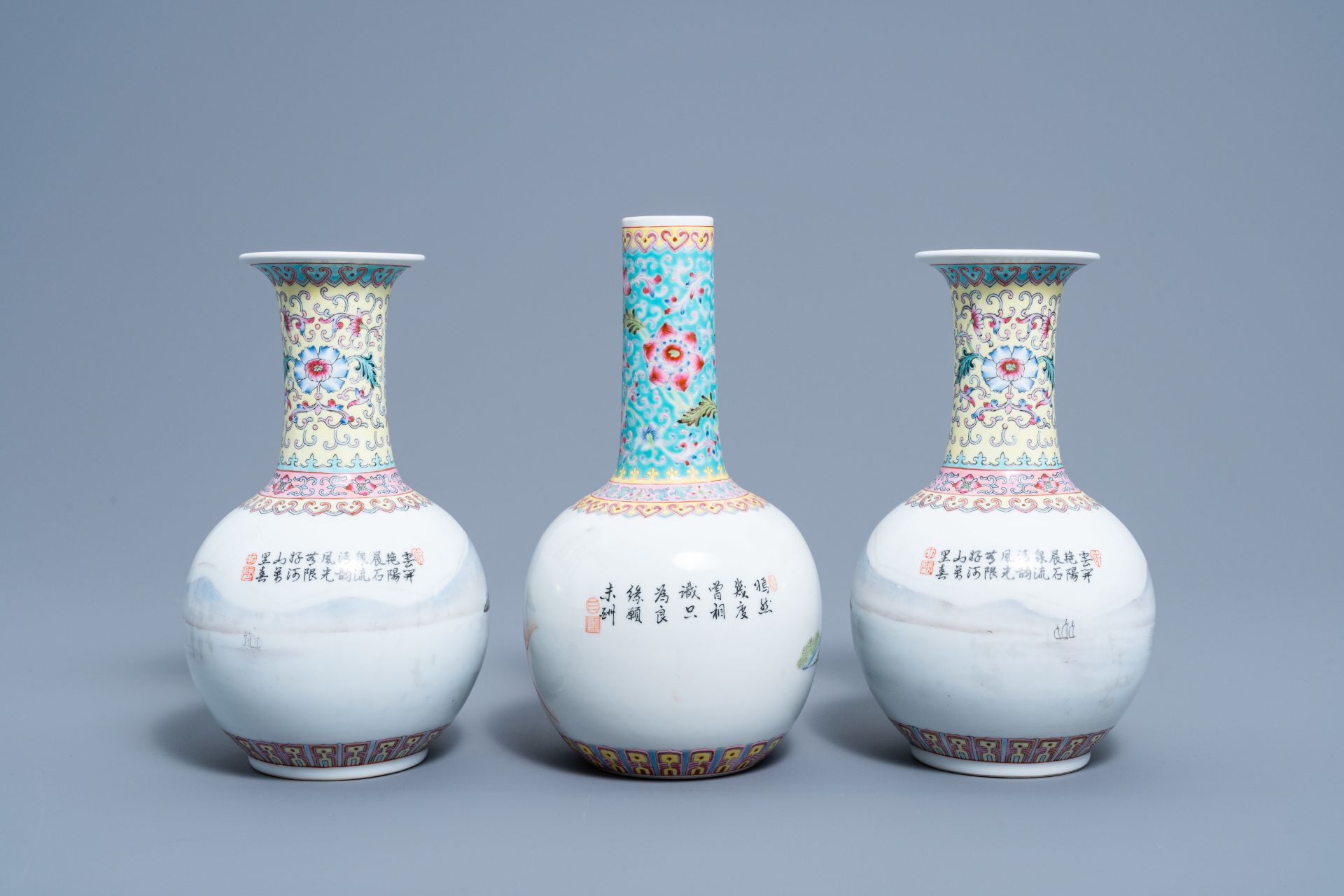 A pair of Chinese bottle shaped famille rose vases with an animated landscape and a vase with figura - Image 3 of 6