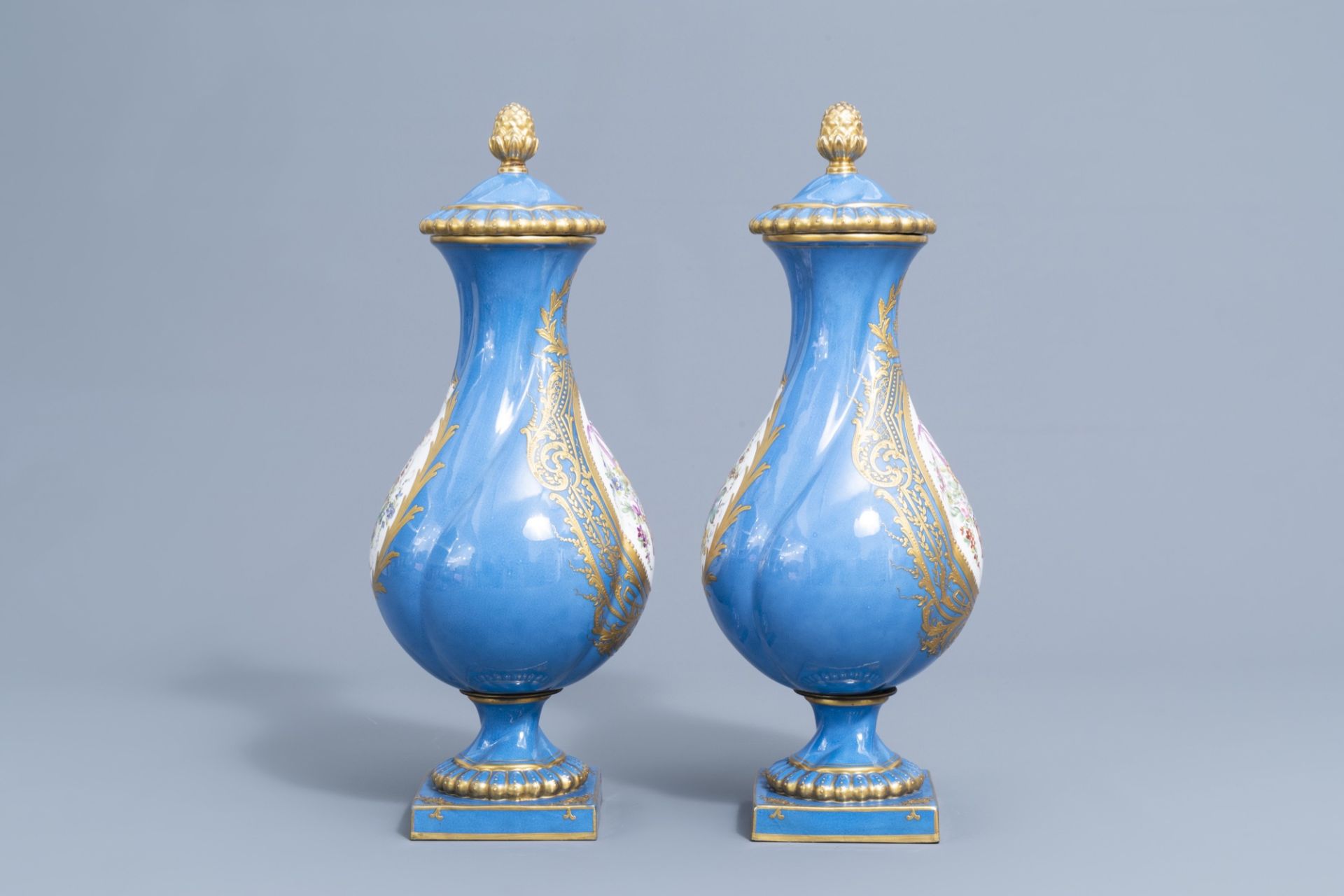 A pair of French gold layered 'bleu celeste' ground vases and covers in the Svres manner and an Emp - Image 3 of 14