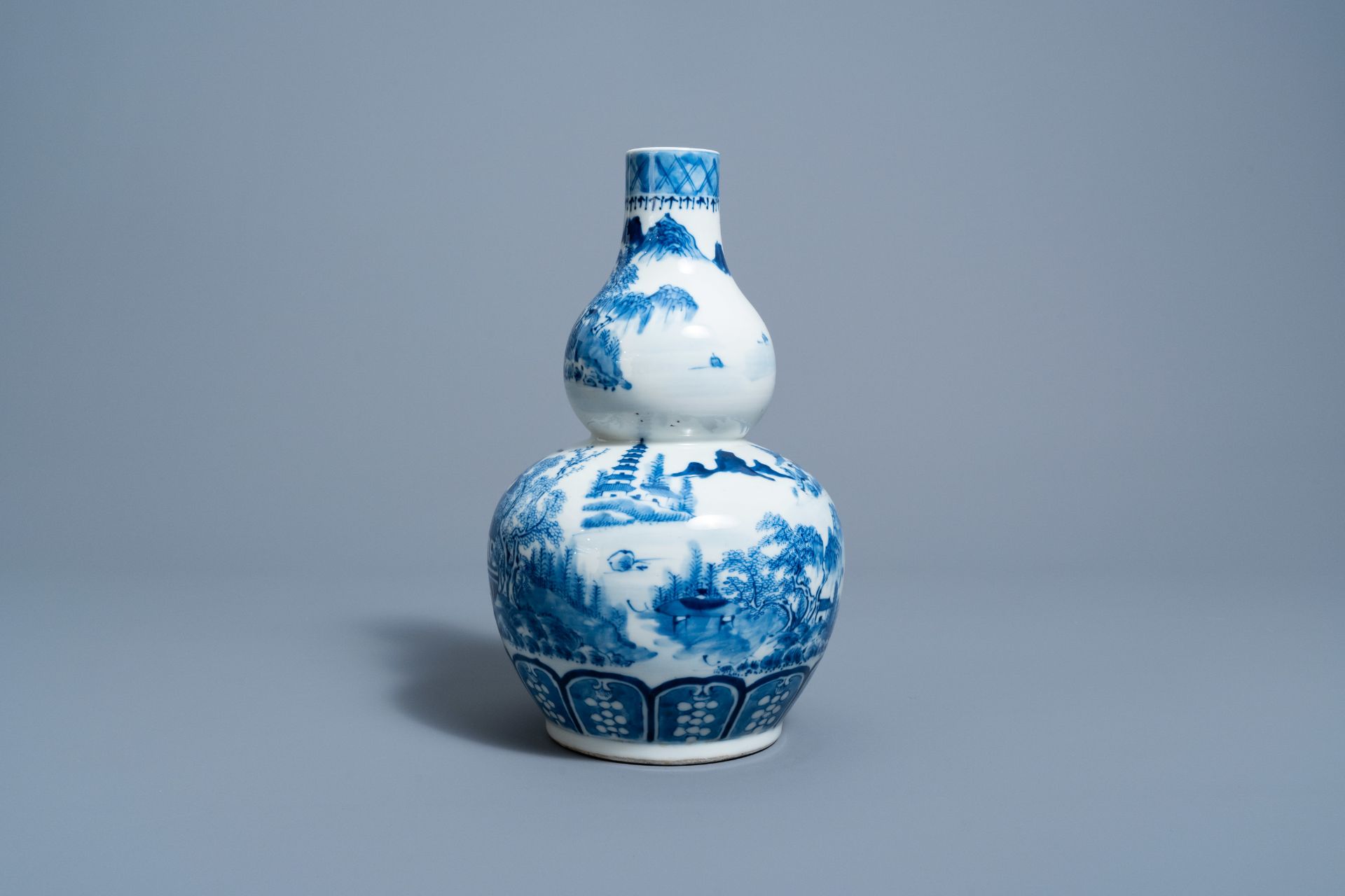 A Chinese blue and white double gourd 'landscape' vase, 19th C. - Image 2 of 6