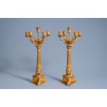 A pair of large French gilt bronze five-light candelabra with winged lions, 19th C.