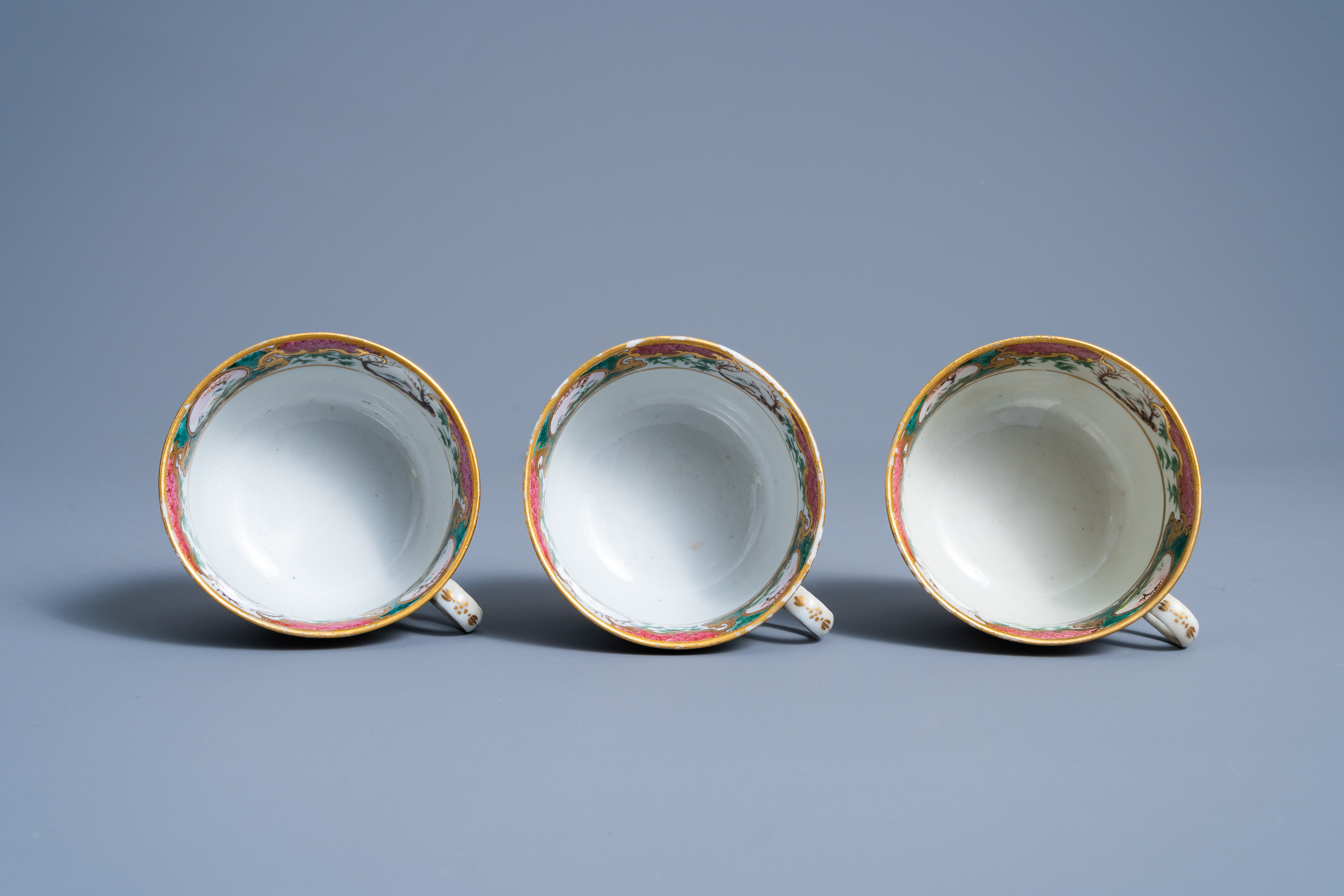 Three Chinese Canton famille rose cups and saucers with figures in a landscape, 19th C. - Image 9 of 10