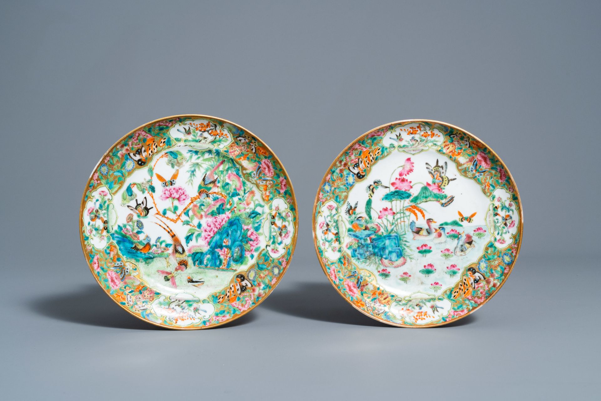 Two Chinese Canton famille rose plates with butterflies and birds among blossoming branches, 19th C. - Image 2 of 3