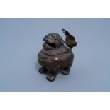 A Chinese bronze buddhist lion censer, 18th C.