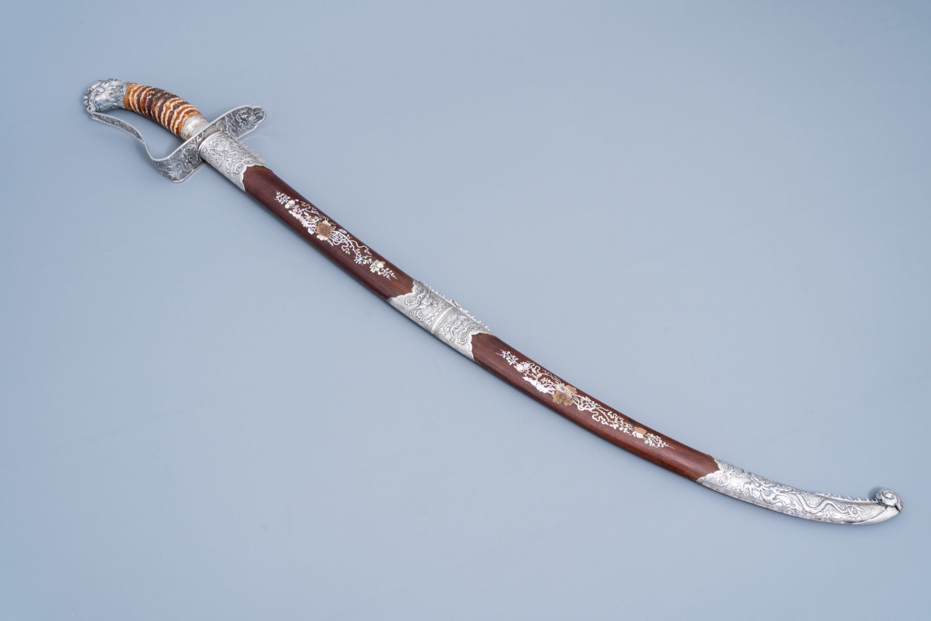 AÊ ceremonial Vietnamese 'guom' sword with silver and mother-of-pearl inlaid wooden scabbard with dr