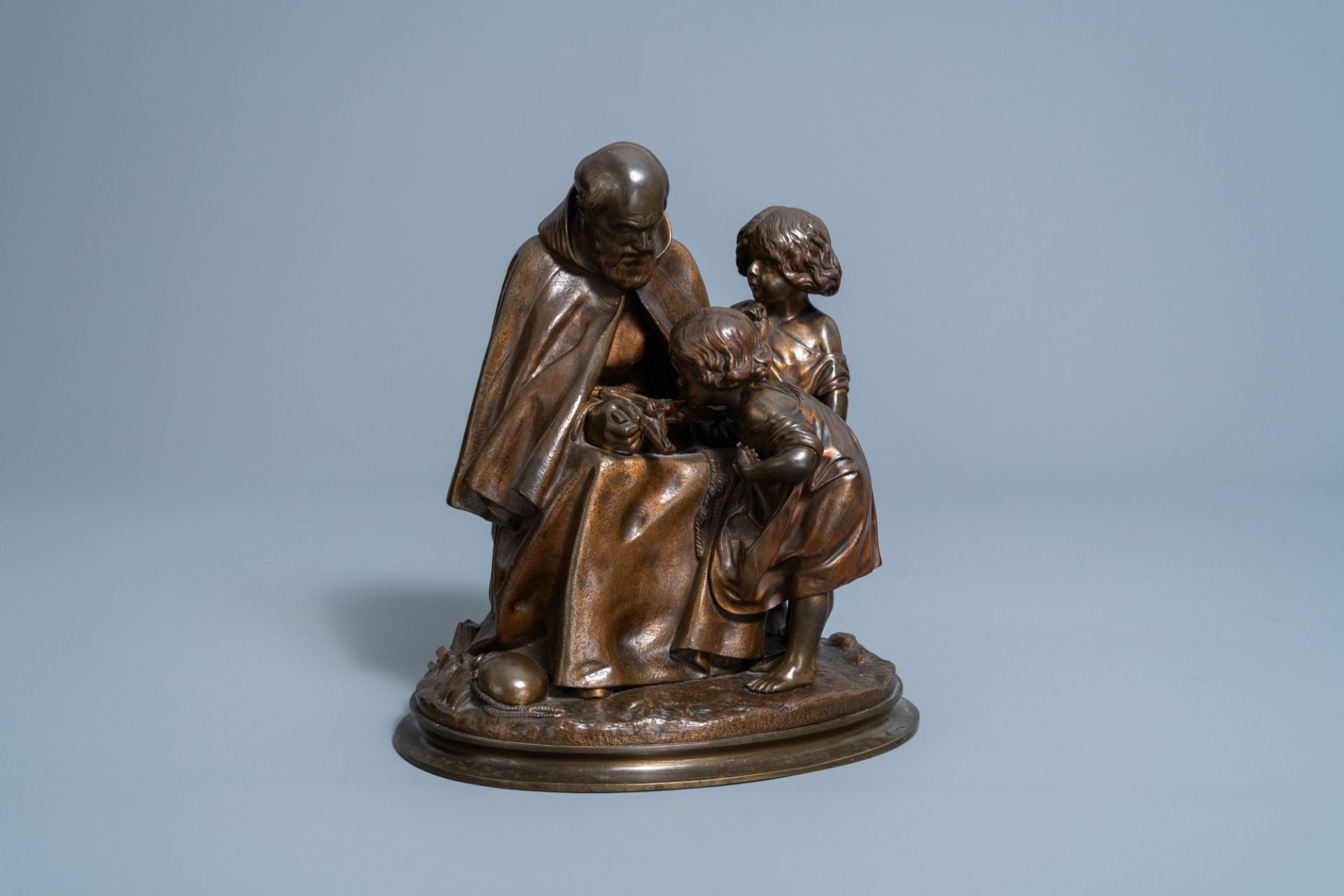 Franois-Michel Pascal (1810-1882): A monk shows two children the body of Christ, brown patinated br