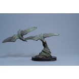 E. Tissot (20th C.): 'Mouettes', green patinated bronze on a black marble base
