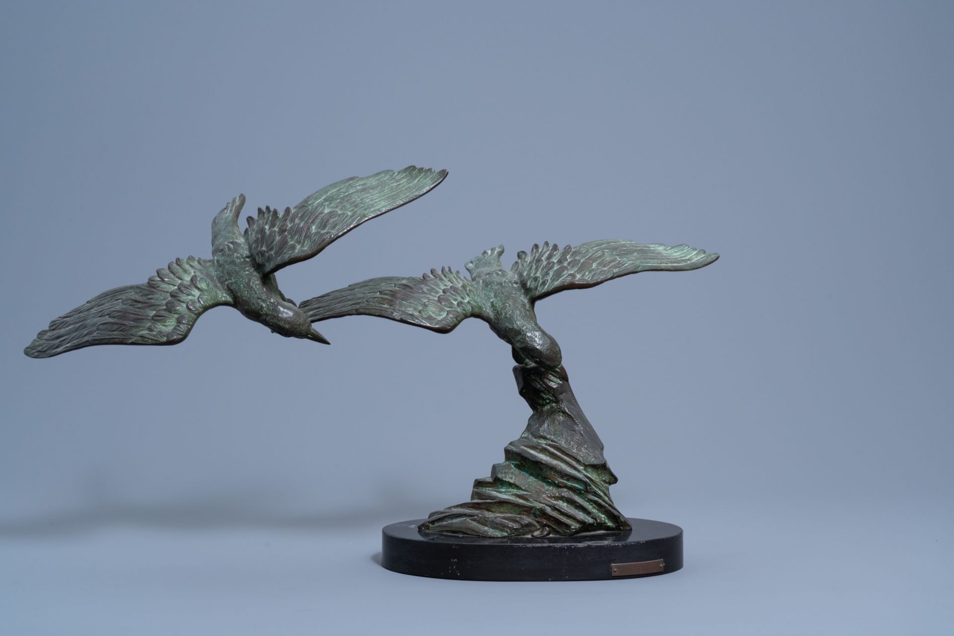 E. Tissot (20th C.): 'Mouettes', green patinated bronze on a black marble base